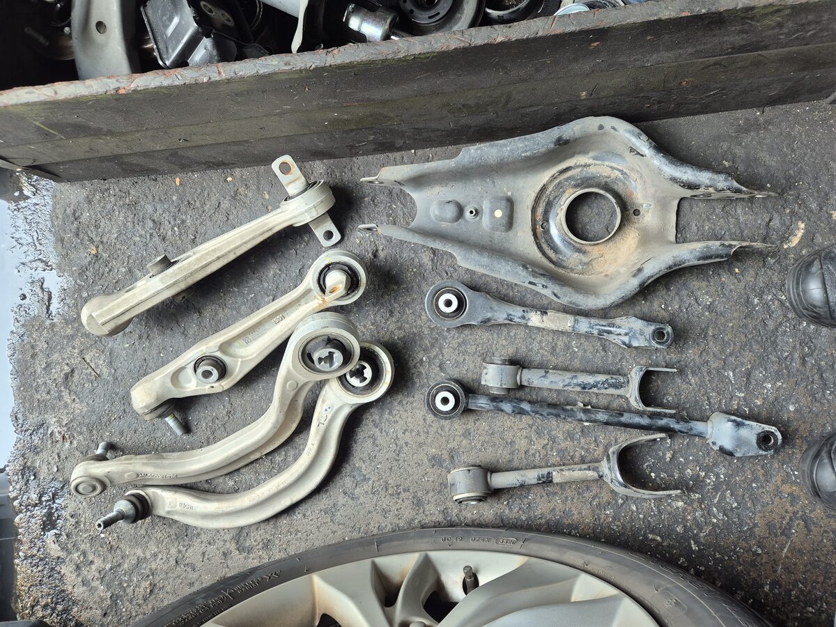 Tesla lower control arm repair at Edwin Garage Singapore