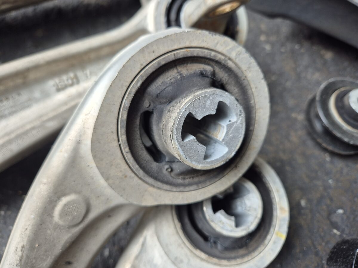 Tesla suspension control arm parts for a repair at Edwin Garage Singapore